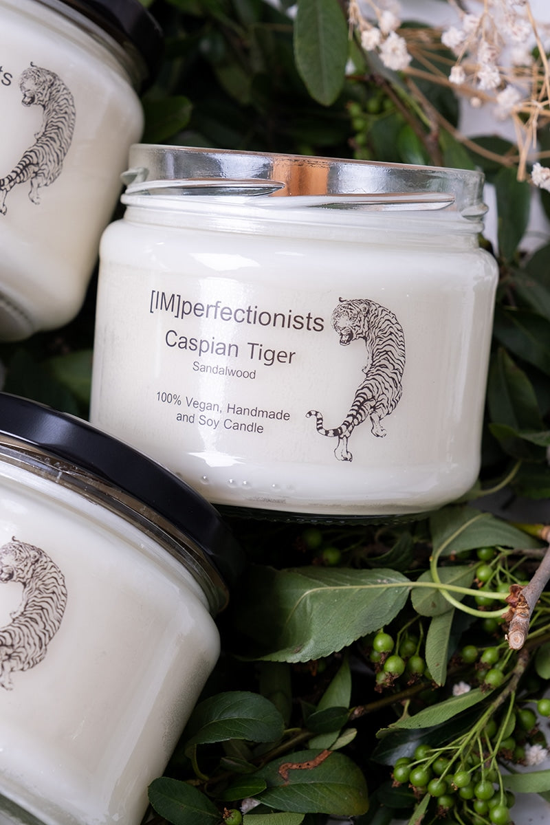 Sandalwood Scented Candle - Caspian Tiger Candle Melts into Hand Cream